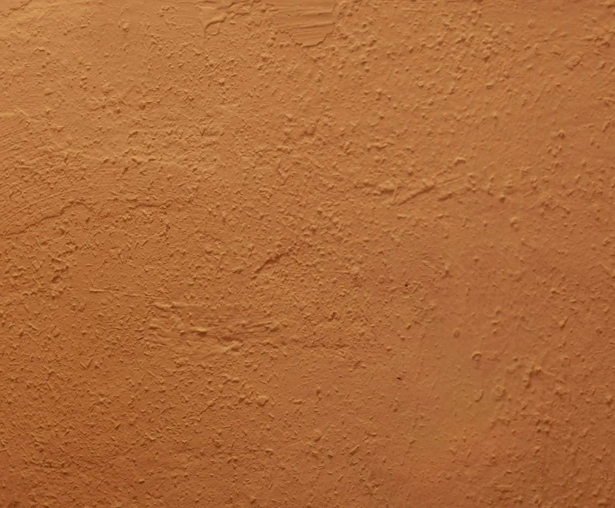 Superficie de barro cocido de color terracota